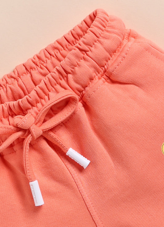 Peach Solid Shorts for Girls by Biskid