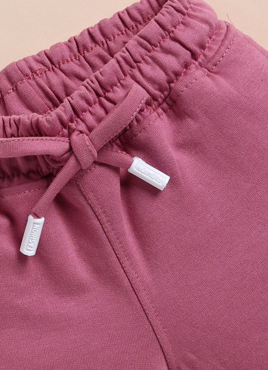 Purple Solid Shorts for Girls by Biskid