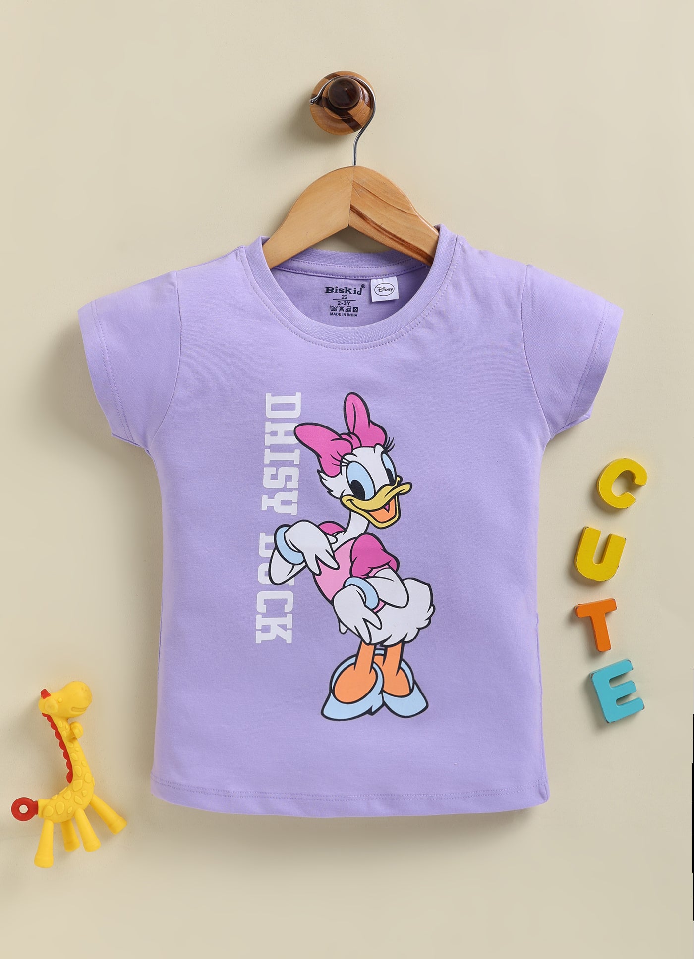 Image file 1819-Prpl--1819-Crm.jpg showing a 2-pack of Biskid girls short-sleeve tops featuring Disney prints, including a cream top with Daisy Duck and Minnie Mouse and a purple top with a Daisy Duck graphic.