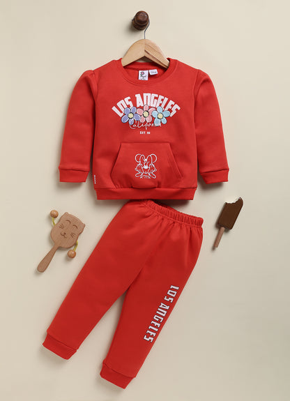 Annie vibrant red Los Angeles graphic sweatshirt and jogger clothing set for girls featuring a floral typography print, a Minnie Mouse outline on a kangaroo pocket, and matching printed sweatpants.