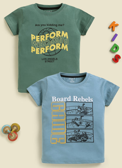 Image file 877-Grn--877-P.Blu.jpg showing a 2-pack of Biskid boys short-sleeve t-shirts featuring graphic prints, including an olive green tee with "PERFORM" typography and a pastel blue tee with "Board Rebels GAME" skateboard comic graphics.