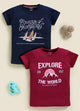Image file 878-Nvy--878-Mron.jpg showing a 2-pack of Biskid boys short-sleeve t-shirts featuring graphic prints, including a navy blue tee with a "Courage of Champions" sailboat graphic and a maroon red tee with an "EXPLORE THE WORLD" mountain sunset print.