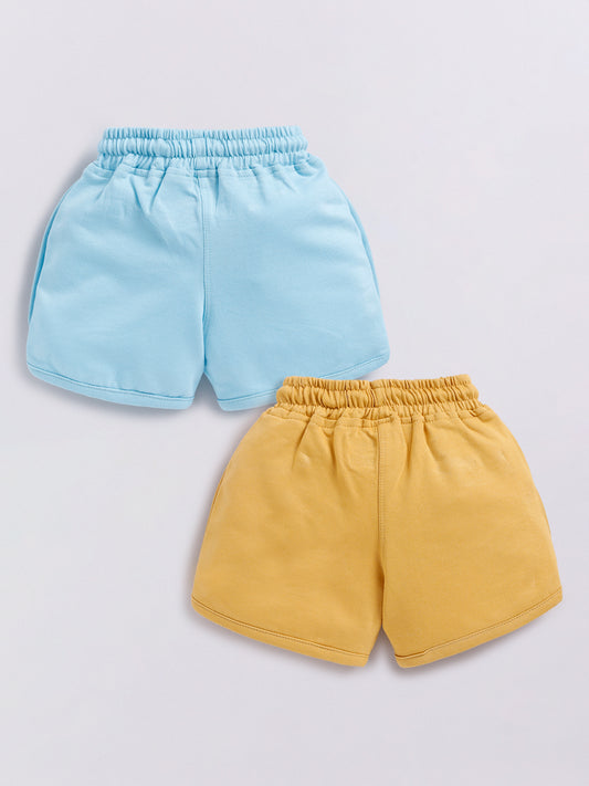 Image file Front combo_5.jpg showing a 2-piece set of Biskid brand girls' casual shorts; one pair is sky blue and the other is mustard yellow, both featuring Minnie Mouse graphics, drawstring waists, and "BISKID" branding on the side pocket.