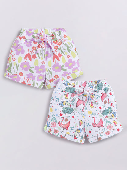Image file Front combo_2.jpg showing a 2-piece set of Biskid brand girls' casual shorts; one pair features a colorful pastel floral print, and the other features a tropical-themed print with flamingos, toucans, and plants on a white background, both with cuffed hems and drawstring waists.