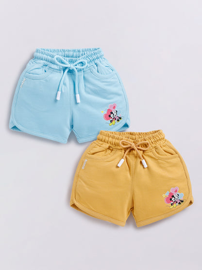 Image file Front combo_5.jpg showing a 2-piece set of Biskid brand girls' casual shorts; one pair is sky blue and the other is mustard yellow, both featuring Minnie Mouse graphics, drawstring waists, and "BISKID" branding on the side pocket.