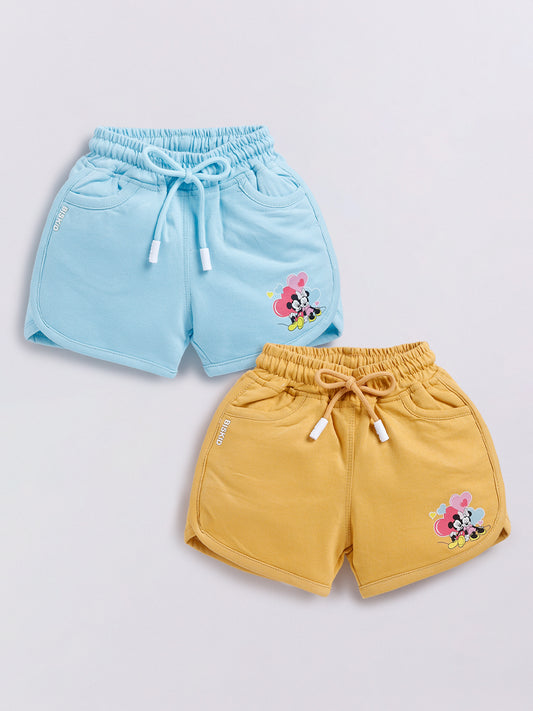 Image file Front combo_5.jpg showing a 2-piece set of Biskid brand girls' casual shorts; one pair is sky blue and the other is mustard yellow, both featuring Minnie Mouse graphics, drawstring waists, and "BISKID" branding on the side pocket.
