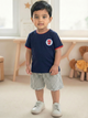 a flat lay of a navy Biskid brand boys short-sleeve t-shirt with red trim, featuring a Spider-Man "WEB-HEAD" graphic, along with icons highlighting its features: stretchable, breathable, light and comfortable, naturally soft, 100% cotton, and ideal for 30°C - 45°C temperatures.