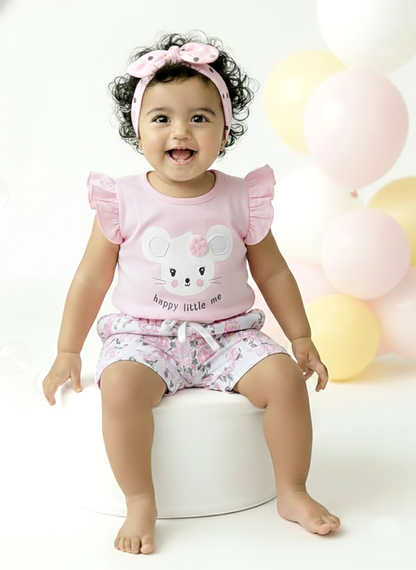 Annie brand girls two-piece clothing set featuring a soft peach flutter-sleeve top with a mouse graphic, 3D flower applique, and the text "happy little me", paired with white shorts featuring a beautiful peach floral print, cuffed hems, and a ruffled elastic waist.