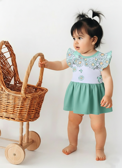 Annie brand girls two-piece frock and panty set. The dress features a white flutter-sleeve bodice with an aqua daisy and butterfly print, a back snap closure, and a solid aqua blue gathered skirt. It comes with a matching white bloomer panty featuring aqua blue ruffled trim on the leg openings.