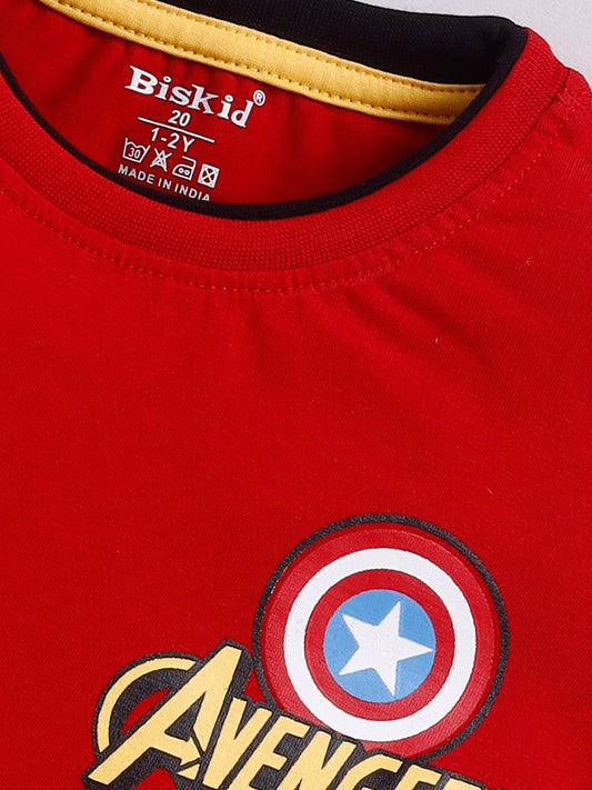 Image file _MG_5120.jpg showing a flat lay of a red Biskid brand boys short-sleeve t-shirt featuring an "AVENGERS" graphic, the Captain America shield logo, and contrasting black and yellow neck trim.