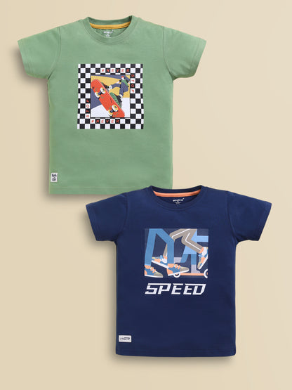 Image file blue_green.jpg showing a 2-pack of Biskid boys short-sleeve t-shirts featuring graphic prints, including an olive green tee with a checkered skater frame graphic and a navy blue tee with "SPEED" skater motion graphics.