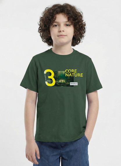 showing a young boy with curly hair modeling a Biskid brand forest green short-sleeve t-shirt. The shirt features a chest graphic containing a photo of a lush green forest, a large yellow number 3, and the text "CORE NATURE" in bright yellow.