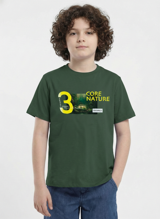 showing a young boy with curly hair modeling a Biskid brand forest green short-sleeve t-shirt. The shirt features a chest graphic containing a photo of a lush green forest, a large yellow number 3, and the text "CORE NATURE" in bright yellow.